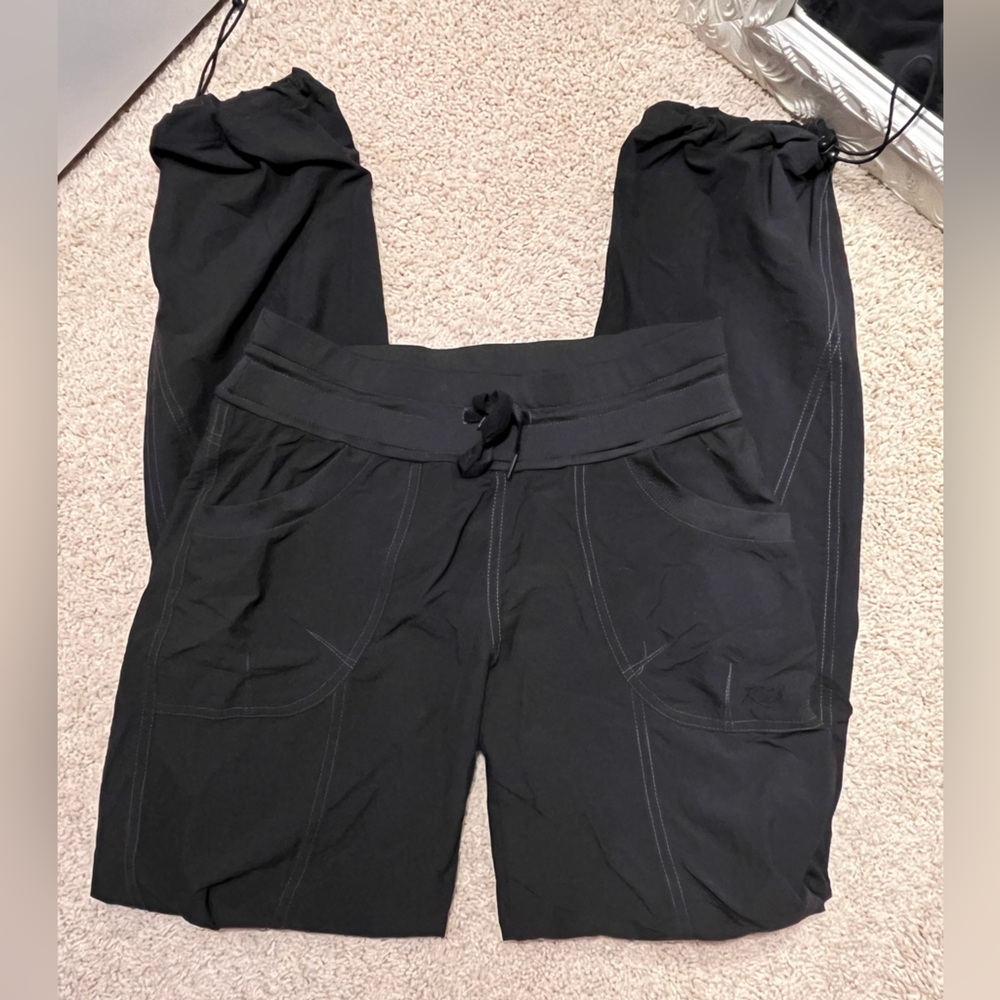Black Kuhl Jogger Size 2 with adjustable ties on ankles.